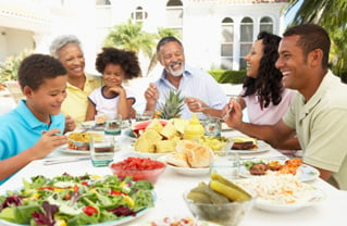 family eating healthy dinner photo