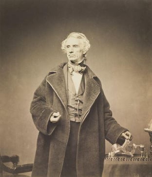 412px-Samuel_Morse_with_his_Recorder_by_Brady_1857