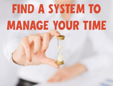 Photo representing Time Management Systems for Business with a hand and an hour glass